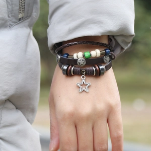 Multilayer leather bracelet with silver star charms and beads in a vintage bohemian style