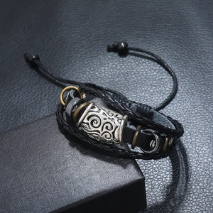 Retro multi-layer braided leather bracelet with silver hollow metal tube and cord closure