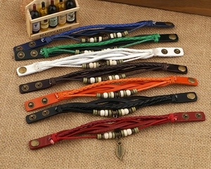 Vintage braided leather bracelets in 7 colors with wooden beads and leaf pendant