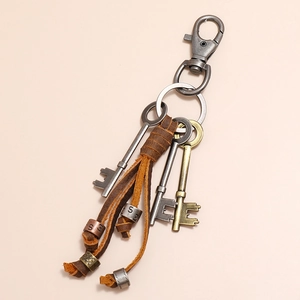 Vintage industrial leather tassel keychain with antique silver hooks and keys