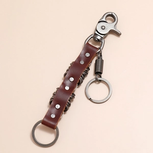 Vintage dark brown leather keychain with silver rivets and heavy duty spring hook