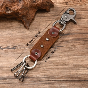 Vintage punk skull leather keychain with zinc alloy hook and brown suede for men pants