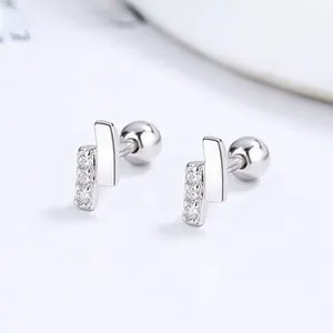 Macro view of 925 silver screw back studs featuring minimalist dual-bar and zircon inlay