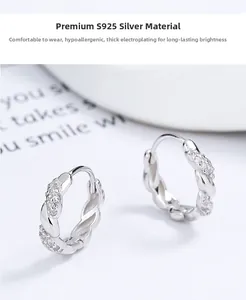 Detailed close-up of S925 sterling silver twisted earrings with sparkling zircon stones