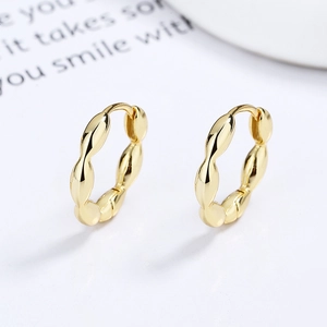 Minimalist gold-plated 925 sterling silver twist hoop earrings with wavy texture