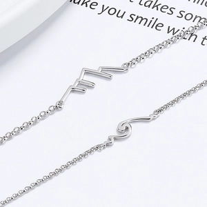 925 silver couples bracelets featuring mountain and wave pendants on a minimalist chain