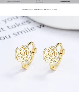 Detail of gold camellia earrings in S925 sterling silver with multi-layer plating