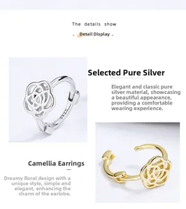 Detailed macro view of S925 sterling silver camellia earrings in gold and silver finish