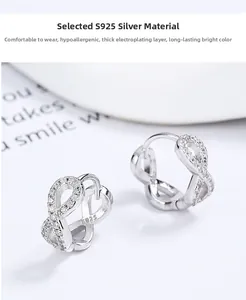 Macro shot of S925 silver infinity earrings with sparkling pavé cubic zirconia