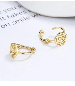 Detailed view of gold plated S925 sterling silver hollow camellia earrings with stamp
