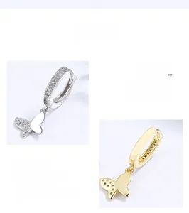 Detailed view of S925 sterling silver butterfly earrings with sparkling cubic zirconia