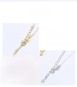 Detail of S925 sterling silver lobster clasp and adjustable chain with teardrop pendant