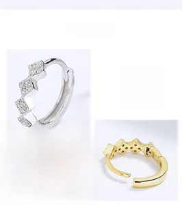 Detail view of S925 sterling silver geometric hoop earrings with pavé cubic zirconia