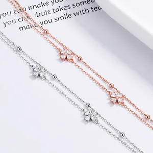 Pulsera de doble capa en plata 925 con trébol de circonitas plateada y oro rosa