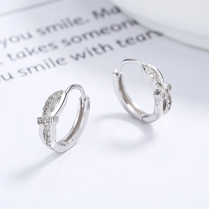 925 Sterling Silver twist hoop earrings with pavé-set sparkling cubic zirconia accents