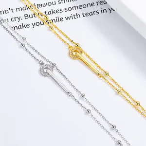 Collar de doble anillo en plata de ley 925 con circonitas cúbicas en oro y en plata