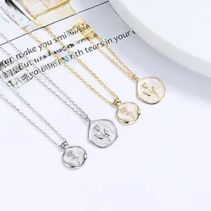 Detail of 925 silver necklace featuring 3D rose and tulip flower pendants with white enamel