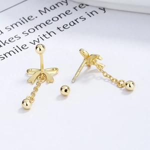 925 silver bow tassel earrings with gold finish and secure screw back closure
