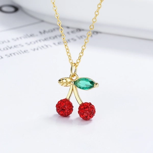 925 silver necklace with sweet red cherry pendant and sparkling green crystal leaf detail