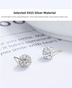 Macro detail of S925 silver Shamballa stud earrings with sparkling pave crystals