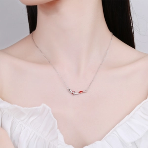 925 Sterling silver koi fish necklace with colorful enamel and sparkling crystals on model