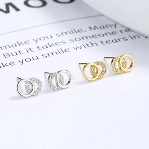 Boucles d'oreilles anneaux entrelacés en argent 925 avec incrustation de zircons