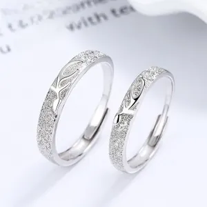 Macro shot of 925 sterling silver couple rings with matte finish and reindeer horn detail