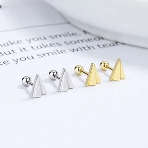 Detailed view of 925 sterling silver and 18K gold plated paper plane screw back earrings