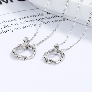 Minimalist 925 sterling silver couple necklaces featuring unique thorn texture pendants