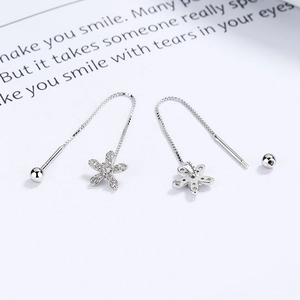 925 silver flower tassel earrings with sparkling zircon crystals on white background