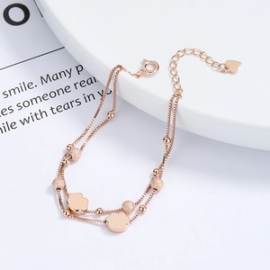 Elegante pulsera de doble capa en plata S925 oro rosa con dijes de flores esmeriladas