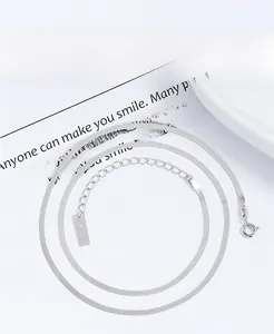 Close-up of 925 sterling silver snake chain showing the S925 hallmark stamp and clasp