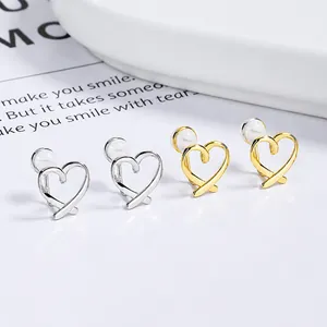 Boucles d'oreilles clips cœur évidé torsadé en argent et or avec coussinets