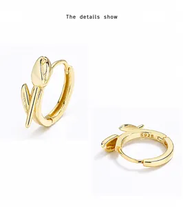 Detailed close-up of S925 sterling silver tulip hoop earrings with gold plated finish