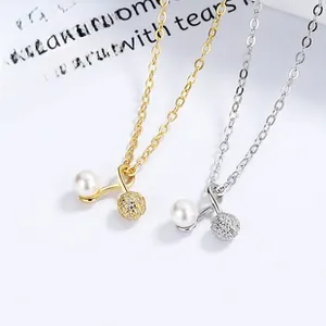 Detailed view of 925 silver pearl pendant necklaces in gold and silver finishes