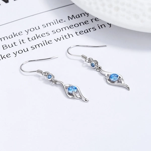 Elegant 999 sterling silver hook earrings with blue zircon stones in a sleek open design