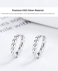 Macro shot of 925 sterling silver beaded hoop earrings with thick plating and anti-allergy features