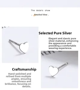 Detailed view of S925 sterling silver stamp on minimalist heart-shaped stud earring