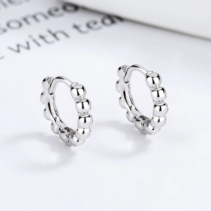 Minimalist 925 sterling silver beaded hoop earrings with a polished bubble design