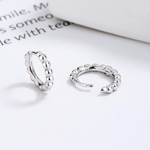 Minimalist 925 sterling silver hoop earrings with a continuous beaded texture for women