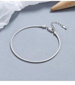 Macro shot of 925 silver square snake chain bracelet with adjustable lobster clasp