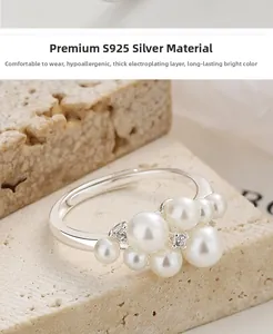 Detailed view of adjustable 925 silver ring with clustered pearls and zircons