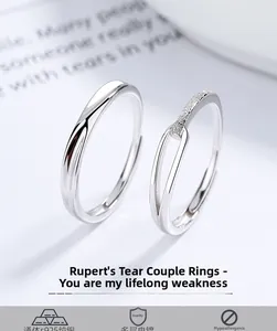 Close-up of S925 silver couple rings with hypoallergenic multi-layer plating
