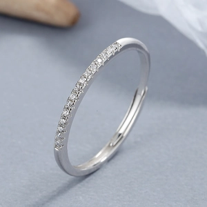 Minimalist 925 sterling silver eternity ring with adjustable band and sparkling pavé stones