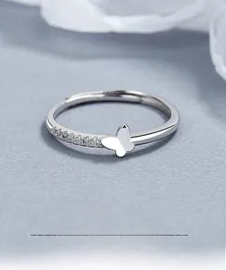 Macro detail of S925 sterling silver butterfly ring with sparkling cubic zirconia inlay