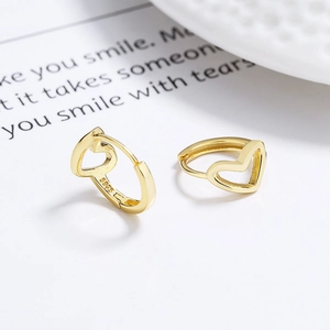 Elegant gold 925 sterling silver hollow heart hoop earrings for women in chic style