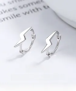Macro shot of 925 sterling silver lightning bolt hoop earrings with multi-layer plating