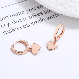 Boucles d'oreilles créoles en argent S925 plaqué or rose avec pendentifs coeur élégants
