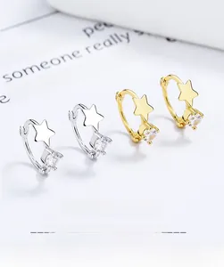 Macro detail of S925 sterling silver star hoop earrings with sparkling zircon stones