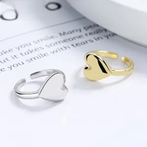 Detailed close-up of 925 sterling silver heart-shaped adjustable ring showing S925 hallmark